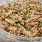 Realistic image of Chicken Salad Made Without Mayo, featuring tender chicken, fresh greens, and a clean olive‑oil dressing.