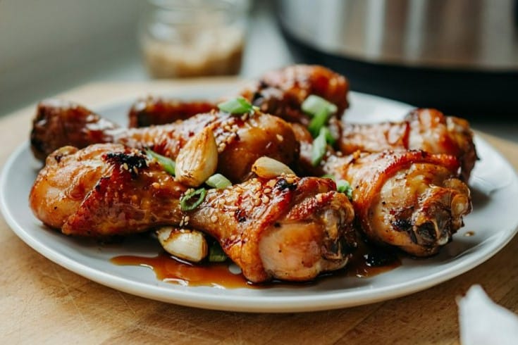 Honey Garlic Air Fryer Chicken Drumsticks That Actually Crisps 10 Honey Garlic Air Fryer Chicken Drumsticks freshly cooked with juicy meat, crispy skin, and caramelized honey garlic glaze
